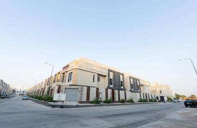 Modern corner villa with a staircase and apartment in Al Rimal neighborhood