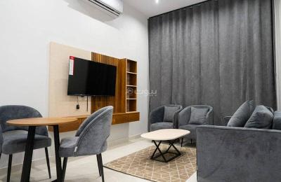 Furnished apartment for rent in Tameer – one room and a living room – including electricity and water