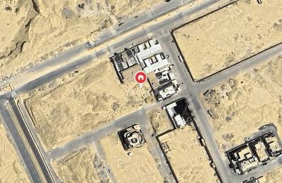 For sale: residential land in Al-Qayrawan neighborhood, area 1,050 square meters
